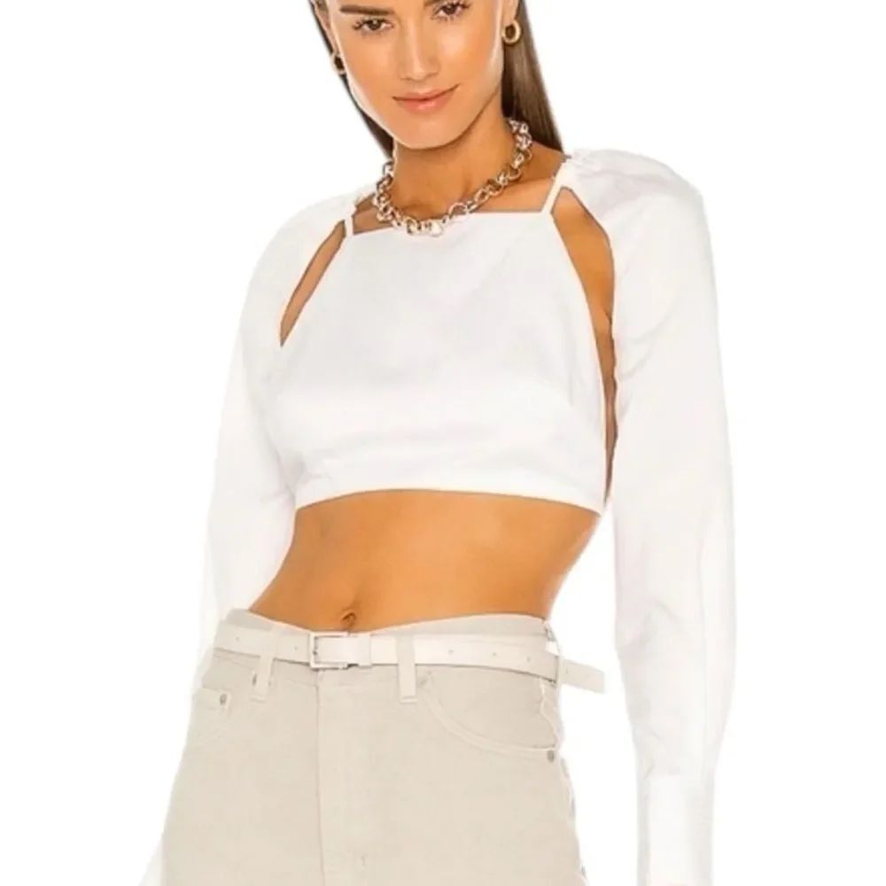 L'Academie White halter backless
Crop Top long sleeves.Medium new with tags